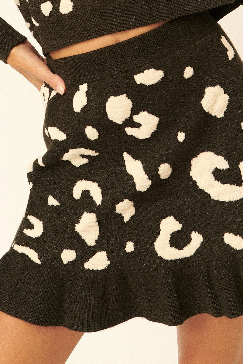 LEOPARD VIBES A Leopard-print Knit Mini Skirt